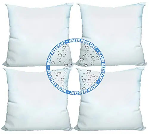 Outdoor pillow inserts: set of four white pillows resistant to outdoor conditions.